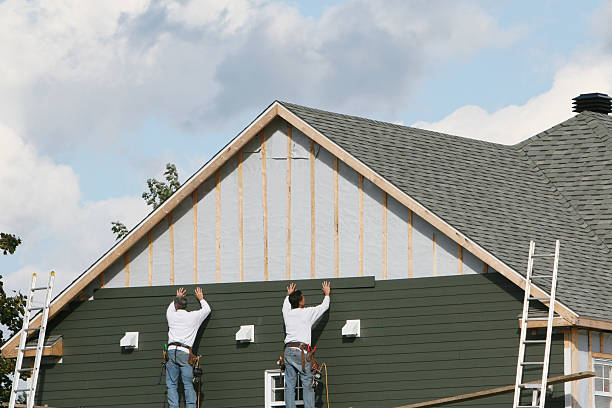 Professional Siding technician working in Bumpass, VA